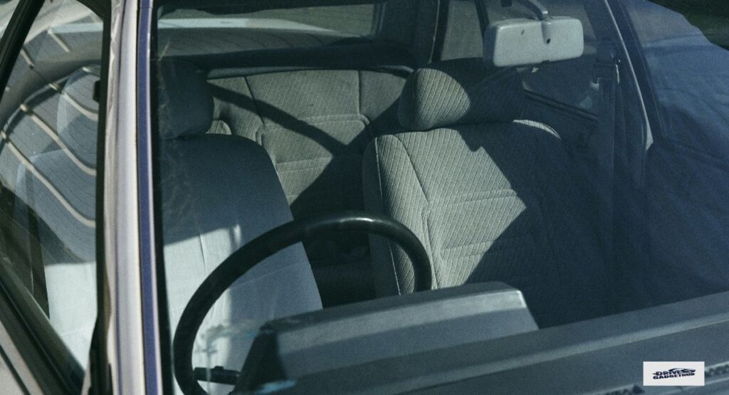 Dashboard and Steering Wheel Protected by Car Sun Shade